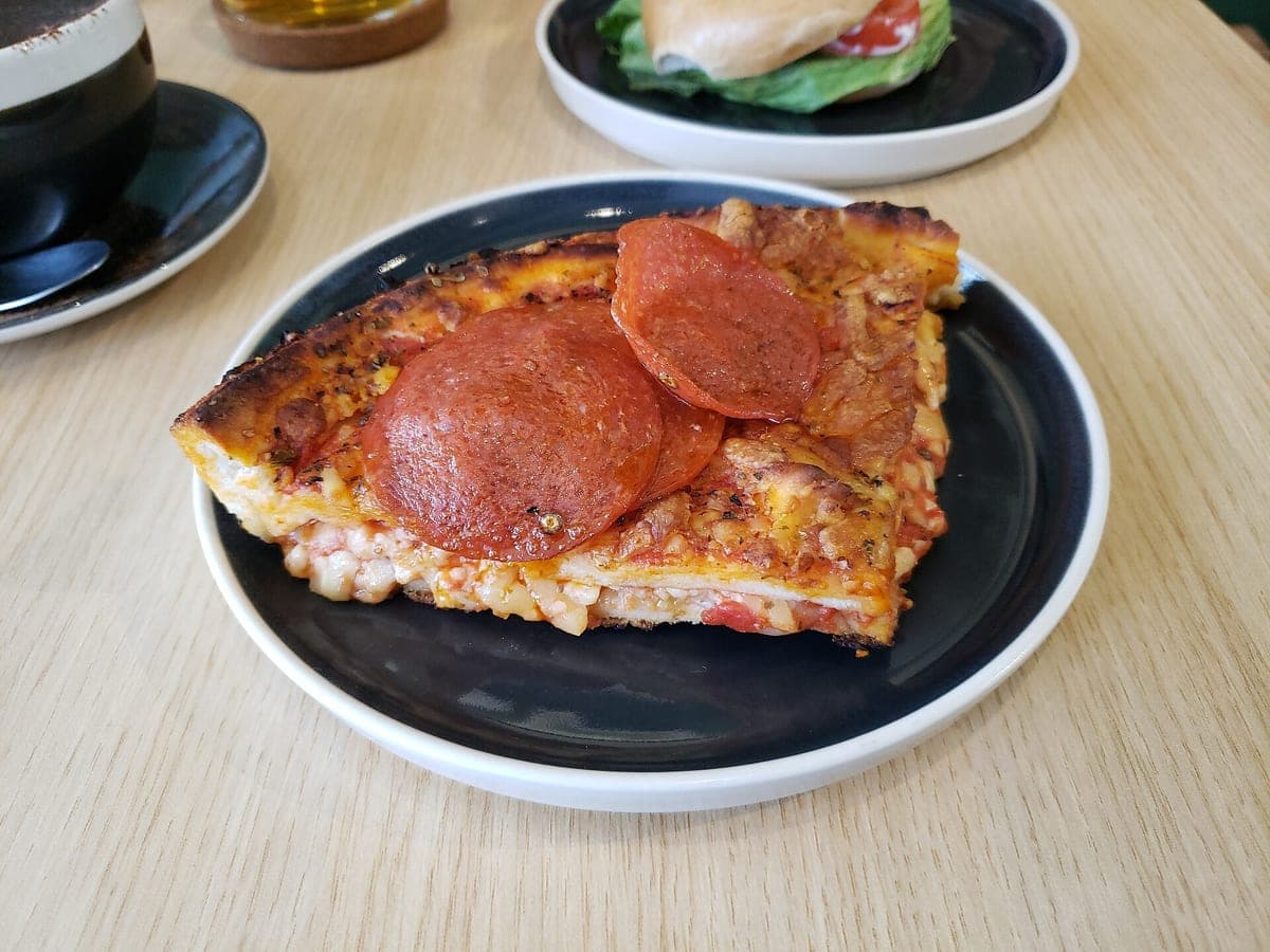 Before: Deep-pan pepperoni slice, original phone photo